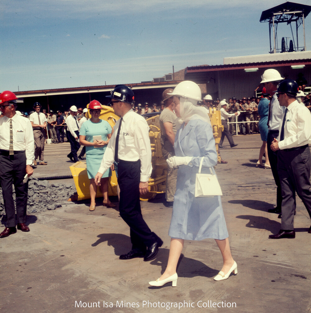 Queen Elizabeth II and Prince Philip inspect machinery at R62 Marshalling Area, Mount Isa Mines, April 1970