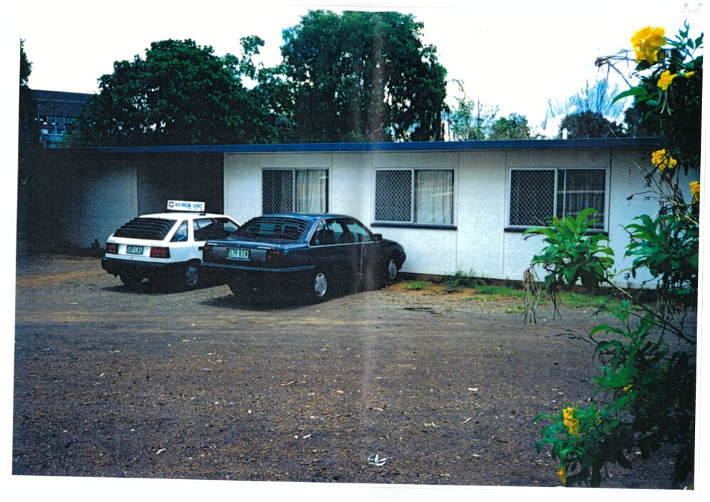 Blue Nursing Service car outside headquarters