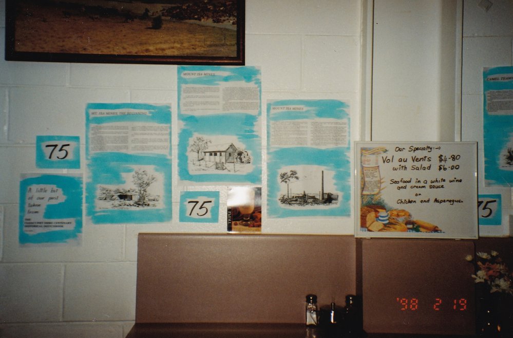 Local cafe with signage for Mount Isa 75th celebration, February 1998