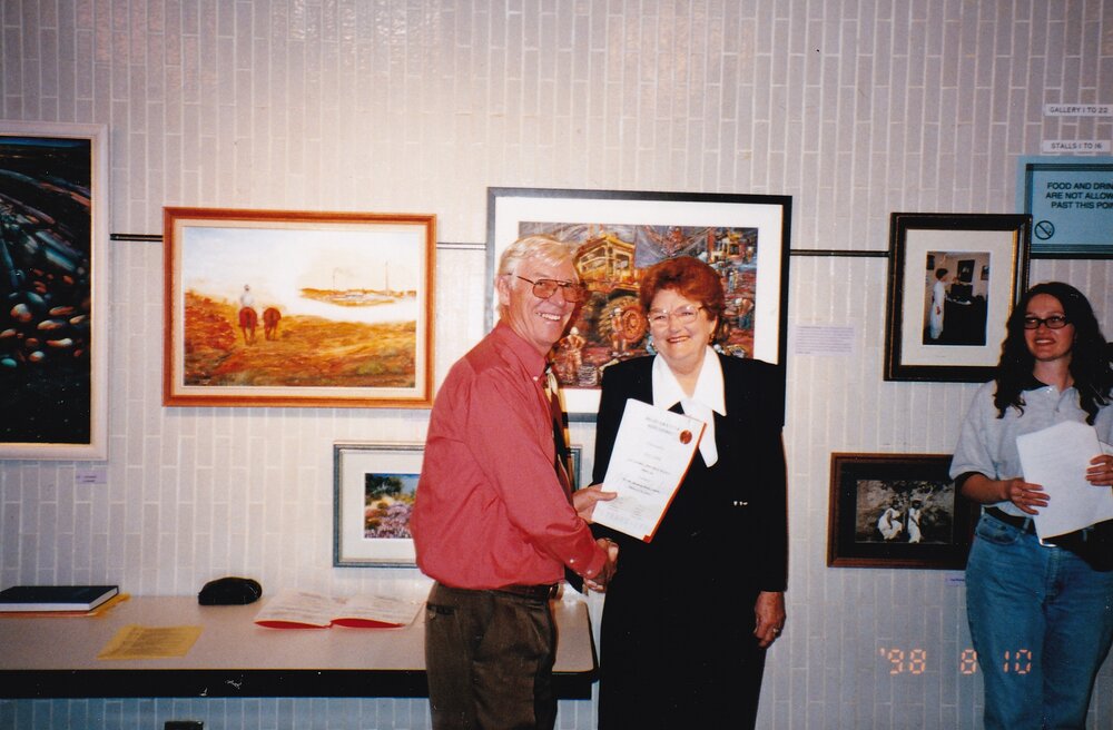 Presenting awards at 75th celebration art event, c.1998