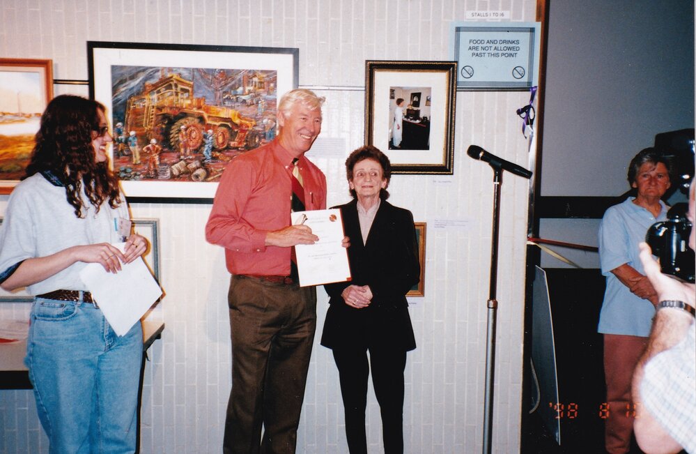 Presenting awards at 75th celebration art event, February 1998
