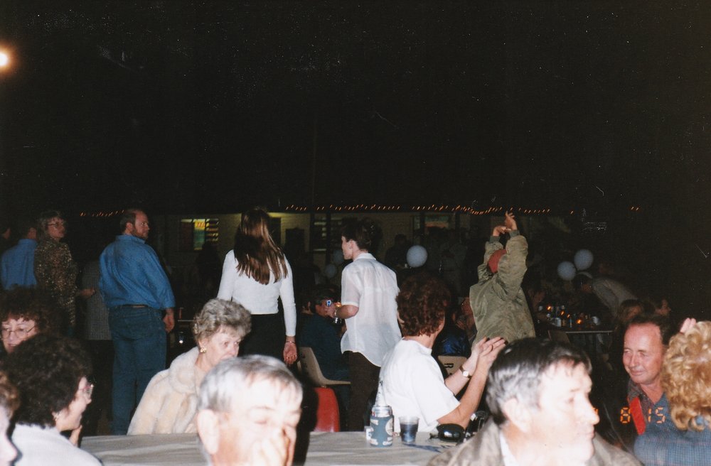 Partygoers at celebration, c.1998
