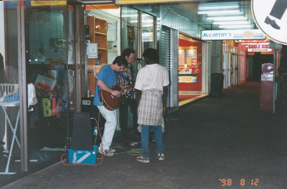 Buskers outside McCarthy's news agency, c.1998
