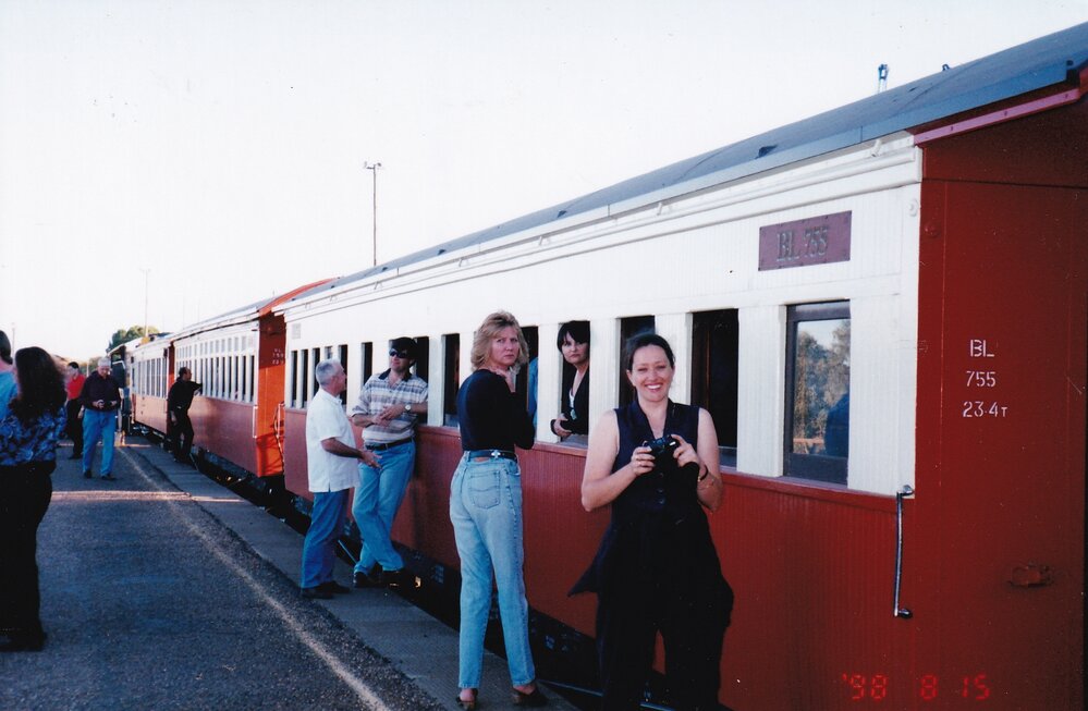 Visitors and locals on train, c.1998