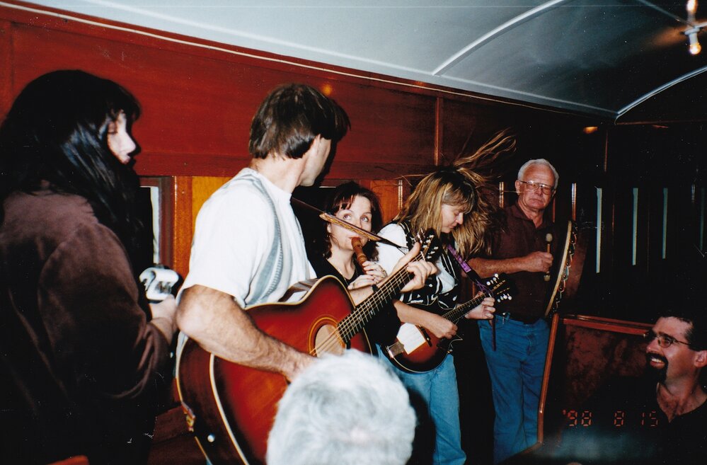 Musicians on train performing, August 1998