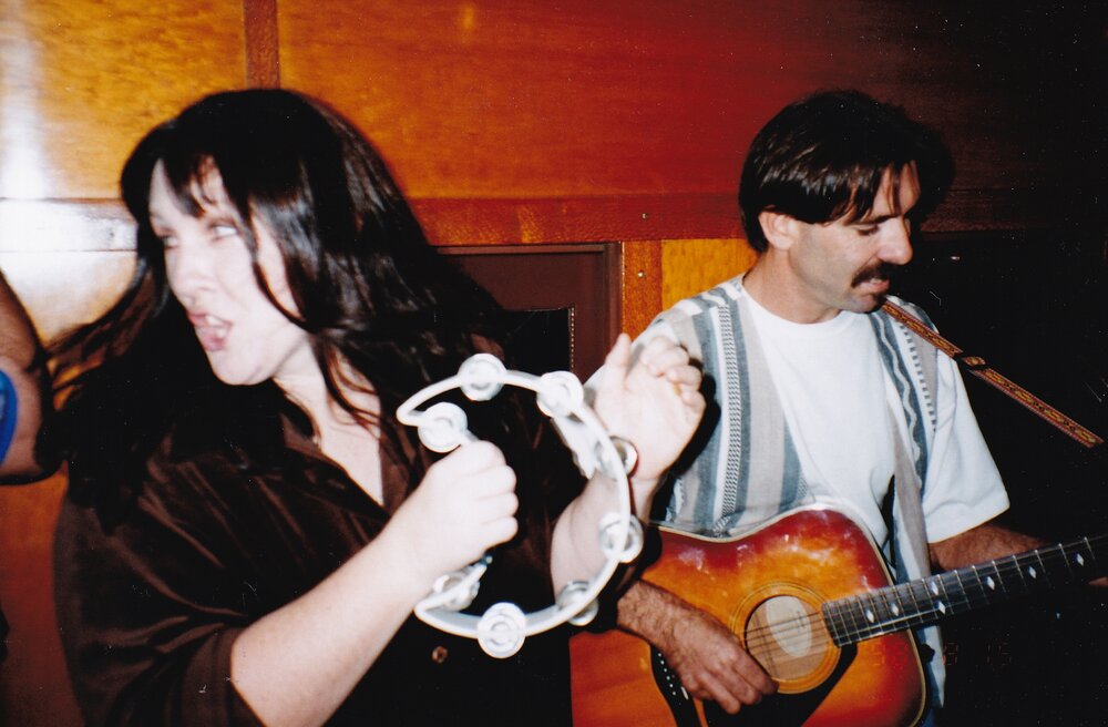 Musicians performing on train, c.1998