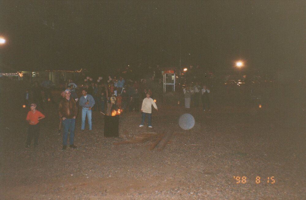 Partygoers at outdoors event, c.1998