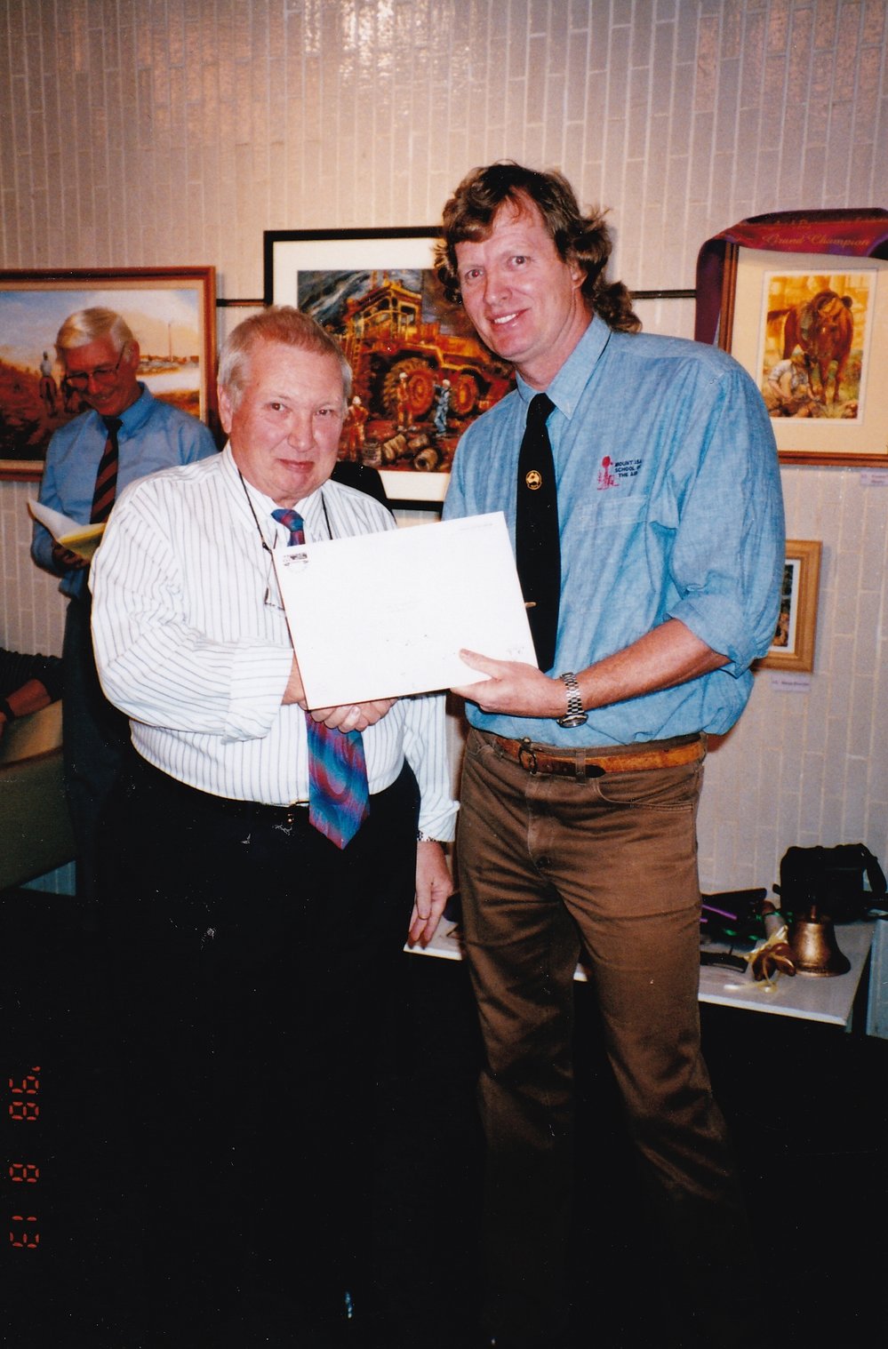 Recipient of award at Civic Centre artwork event, c.1998