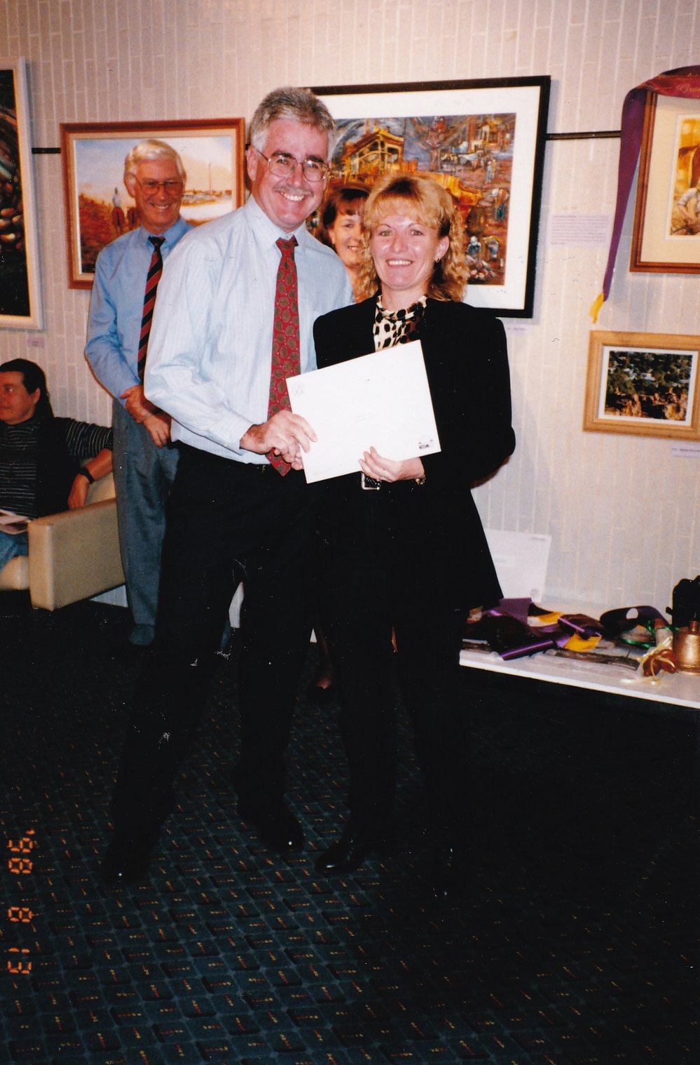 Recipient of award at Civic Centre artwork event, c.1998