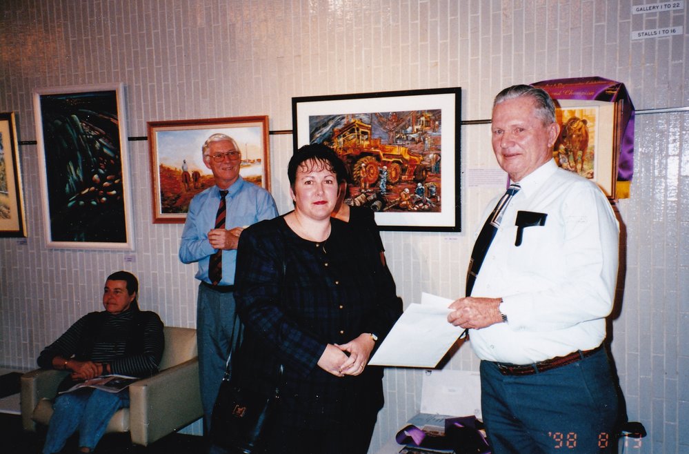 Recipient of award at Civic Centre art event, c.1998