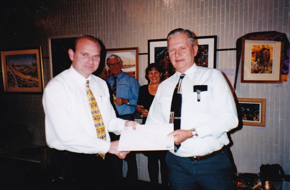 Recipient of award at Civic Centre art event, c.1998