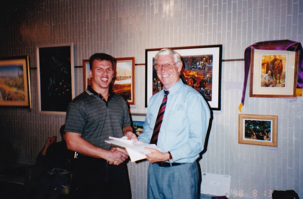Recipient of award at Civic Centre art event, c.1998