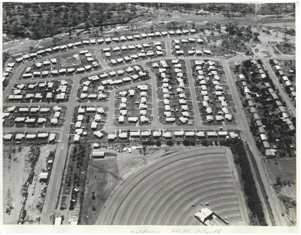Aerial view of Soldiers Hill and Tropicaire Drive In Theatre, February 1973