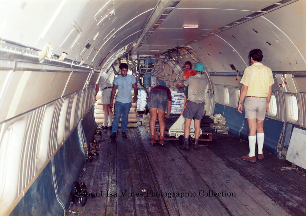 DC8 at Mount Isa airport unloading supplies during floods, June 1975