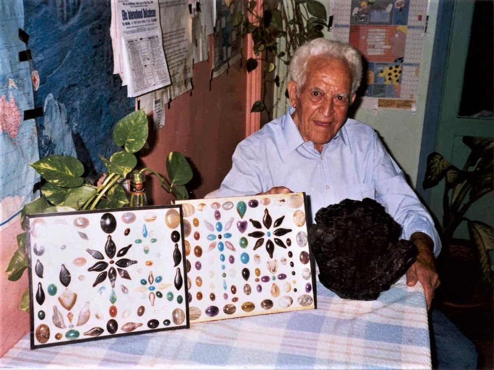 Lapidary Club member with his cabachons &amp; tourmaline crystals, c.1993