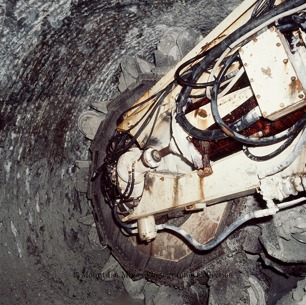 Mobile miner cutting head, Mount Isa Mines, c.1986