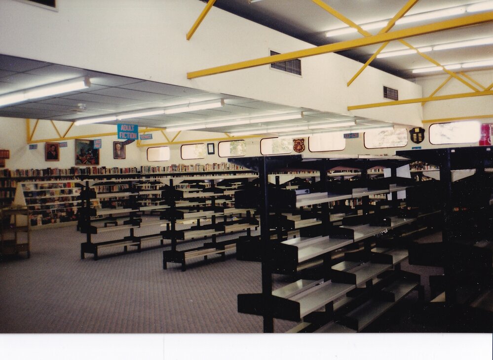 Empty book shelves,  Mount Isa City Library
