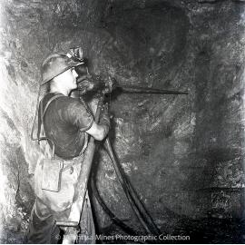 Driller working underground, Mount Isa Mines, August 1958