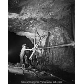 Arm and bar drilling at Lead mine, Mount Isa Mines, June 1958