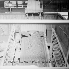 Magnet on conveyor at mill, Mount Isa Mines, November 1959