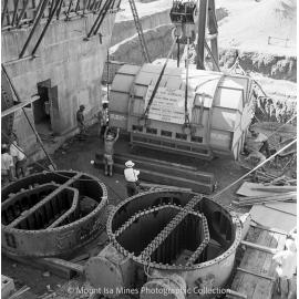 Lifting stator into position, Mica Creek Power Station, February 1959