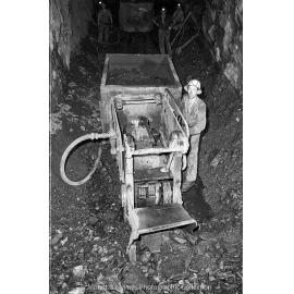 Rail mounted swing loader, Mount Isa Mines, May 1959