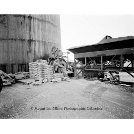 Concrete mixing at base of new Copper Stack, Mount Isa Mines, September 1959