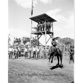 Mount Isa Rotary Rodeo Rough Riding, Spear Creek, September 1959