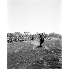 Mount Isa Rotary Rodeo Rough Riding, Spear Creek, September 1959