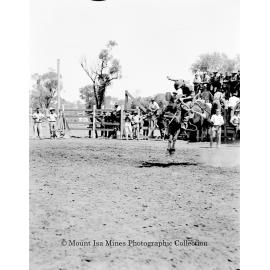 Mount Isa Rotary Rodeo Rough Riding, Spear Creek, September 1959