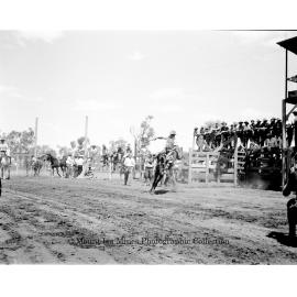 Mount Isa Rotary Rodeo Rough Riding, Spear Creek, September 1959