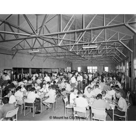 Mount Isa Mines BSD mess interior during meal, c.1956