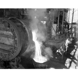 Pouring molten copper from converter at Copper Smelter, Mount Isa Mines, c.1956