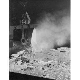 Copper Smelter pouring slag foundations old Reverbatory Furnace, Mount Isa Mines, c.1950