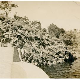 Man standing at experimental dam