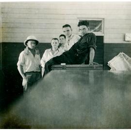 Group of men having a beer in hotel 