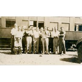 Group of men at railway station Mount Isa 