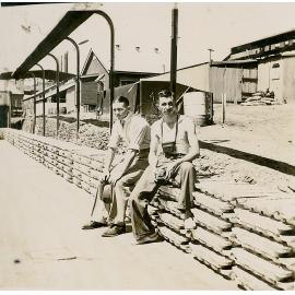 Norm Nancarrow and Tom on stacked lead ingots 