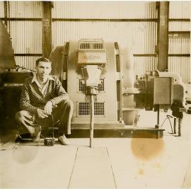 Photographer at Winder Motor for borehole ropeway No 2 Ore Shaft