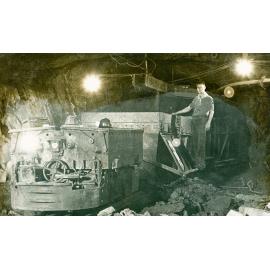 Unloading gable car at ore pocket, A Hunt Postcard 