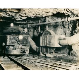 Ventilation fan and Mancha battery powered locomotive on 5 Level Rio Grande, Mount Isa Mines