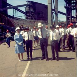 Queen Elizabeth II and Prince Philip inspect machinery at R62 Marshalling Area, Mount Isa Mines, April 1970