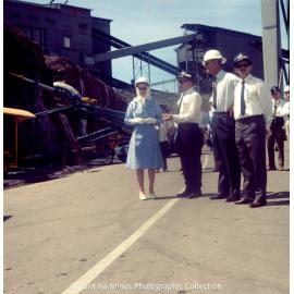 Queen Elizabeth II and Prince Philip inspect machinery at R62 Marshalling Area, Mount Isa Mines, April 1970