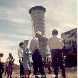 Queen Elizabeth II and Prince Philip view photograph of underground haulage operations, Mount Isa Mines, April 1970
