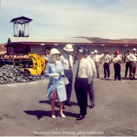 Queen Elizabeth II, Prince Philip, and Ken Finlay inspect machinery R62 Marshalling Area, Mount Isa Mines, April 1970