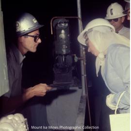 Queen Elizabeth II inspects sample of flotation froth, Mount Isa Mines, April 1970