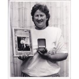 Valerie Brown receiving award