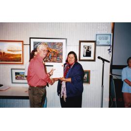 Presenting awards at 75th celebration art event, c.1998