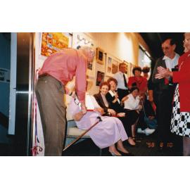 Presenting awards at 75th celebration art event, c.1998
