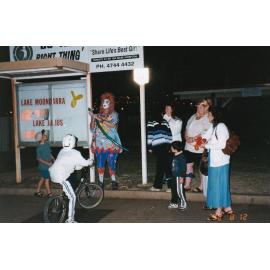 Balloon animal clown with children, August 1998
